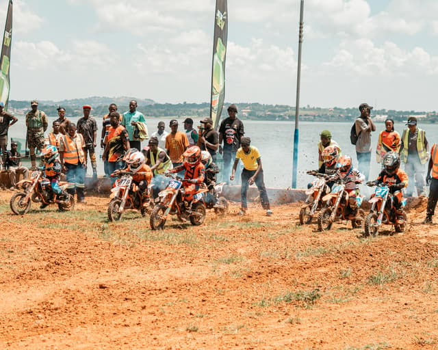 Motocross race with Lake Victoria behind the riders