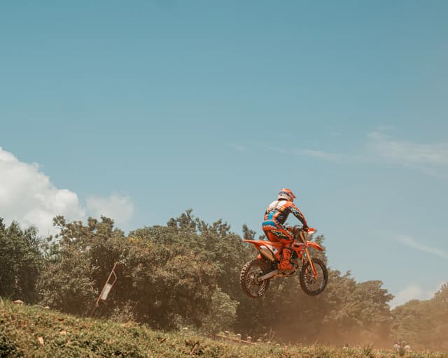 Motocross rider airborne during a hosted race event