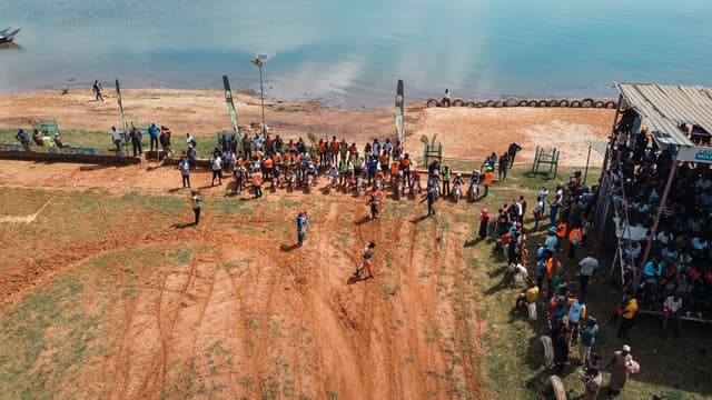 People gathered at the lakeside during an event