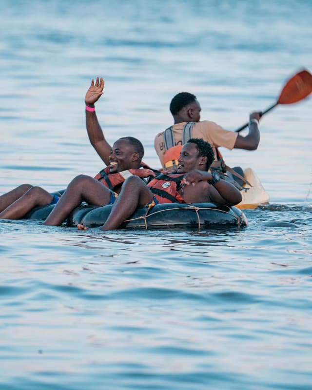 Visitors on tubes in the water